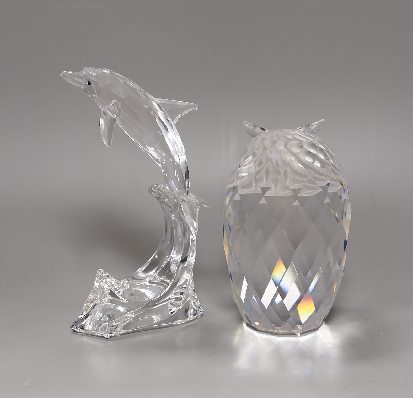 Swarovski crystal - two large boxed models: an owl and a dolphin, dolphin 20 cms high